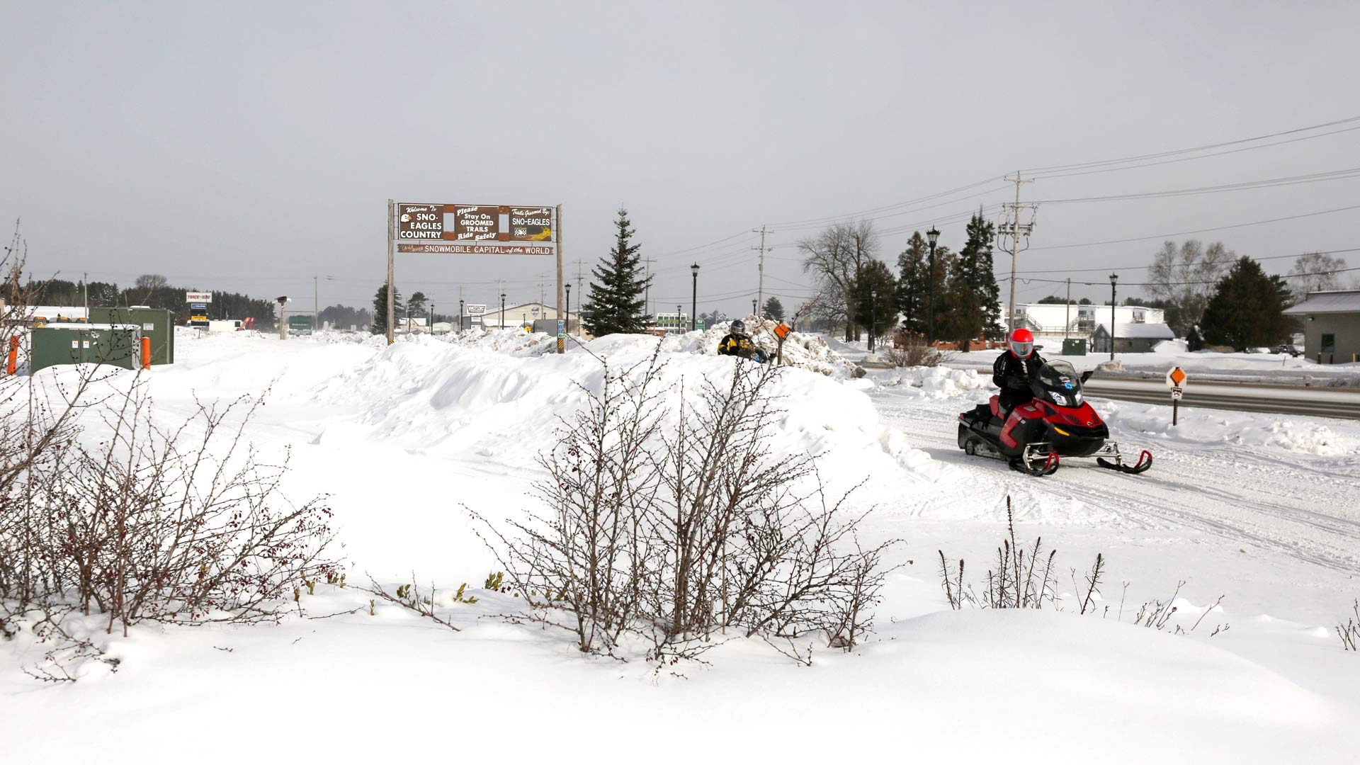 Snowmobilers on Sno-Eagles trails in Vilas County, Wisconsin