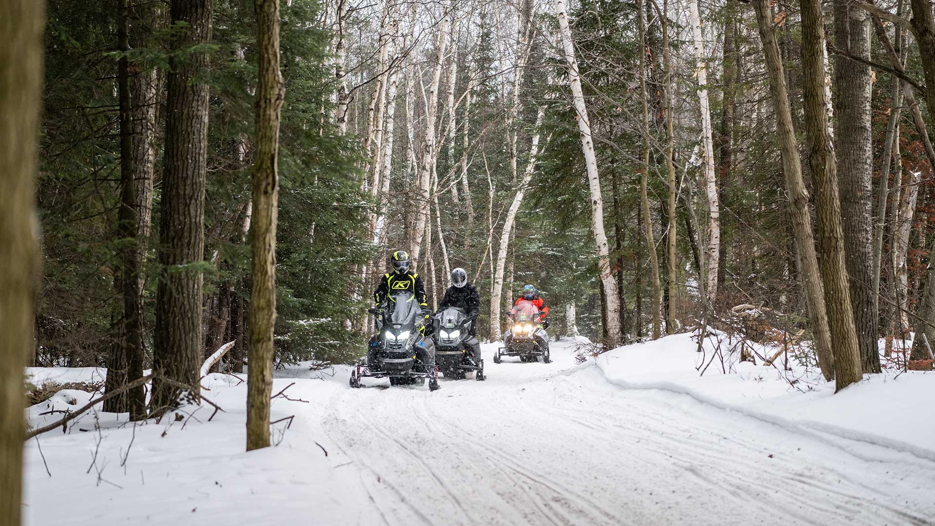 A group of riders on Phelps Snowmobile Club Trails