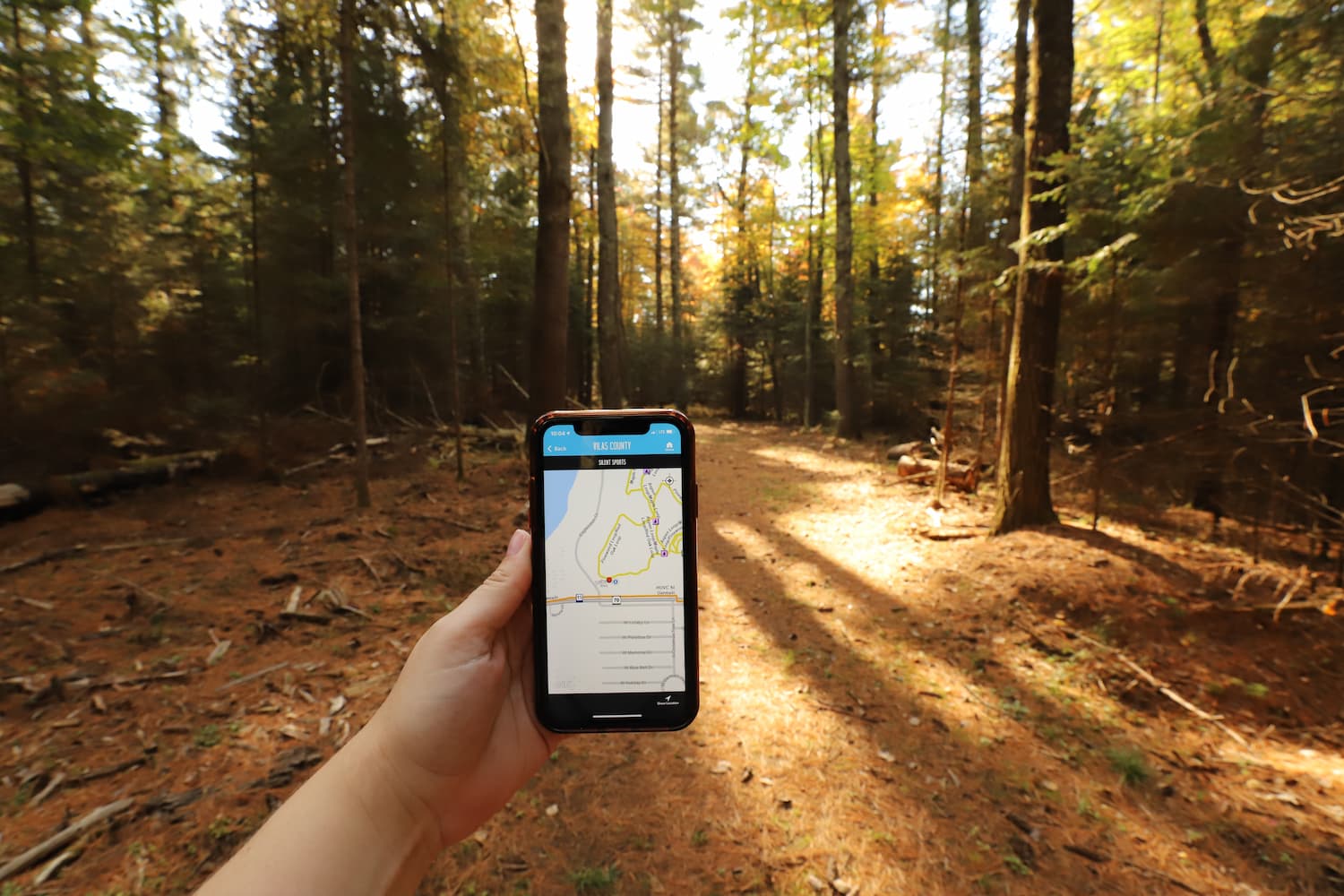 Using the Vilas County trails app on the Awassa Trail in St. Germain