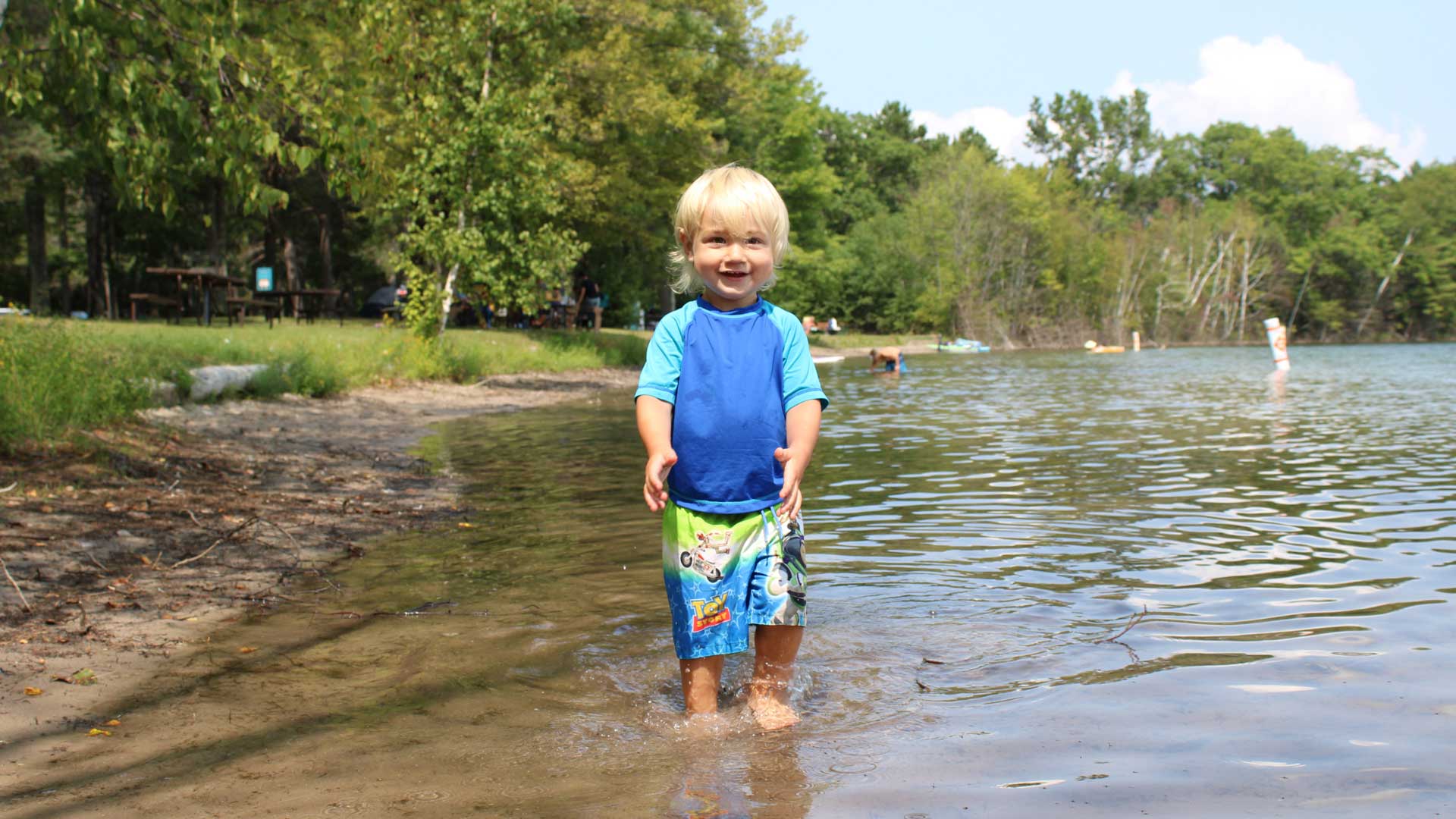 Child at beach on Crystal Lake Campground Vilas County WI
