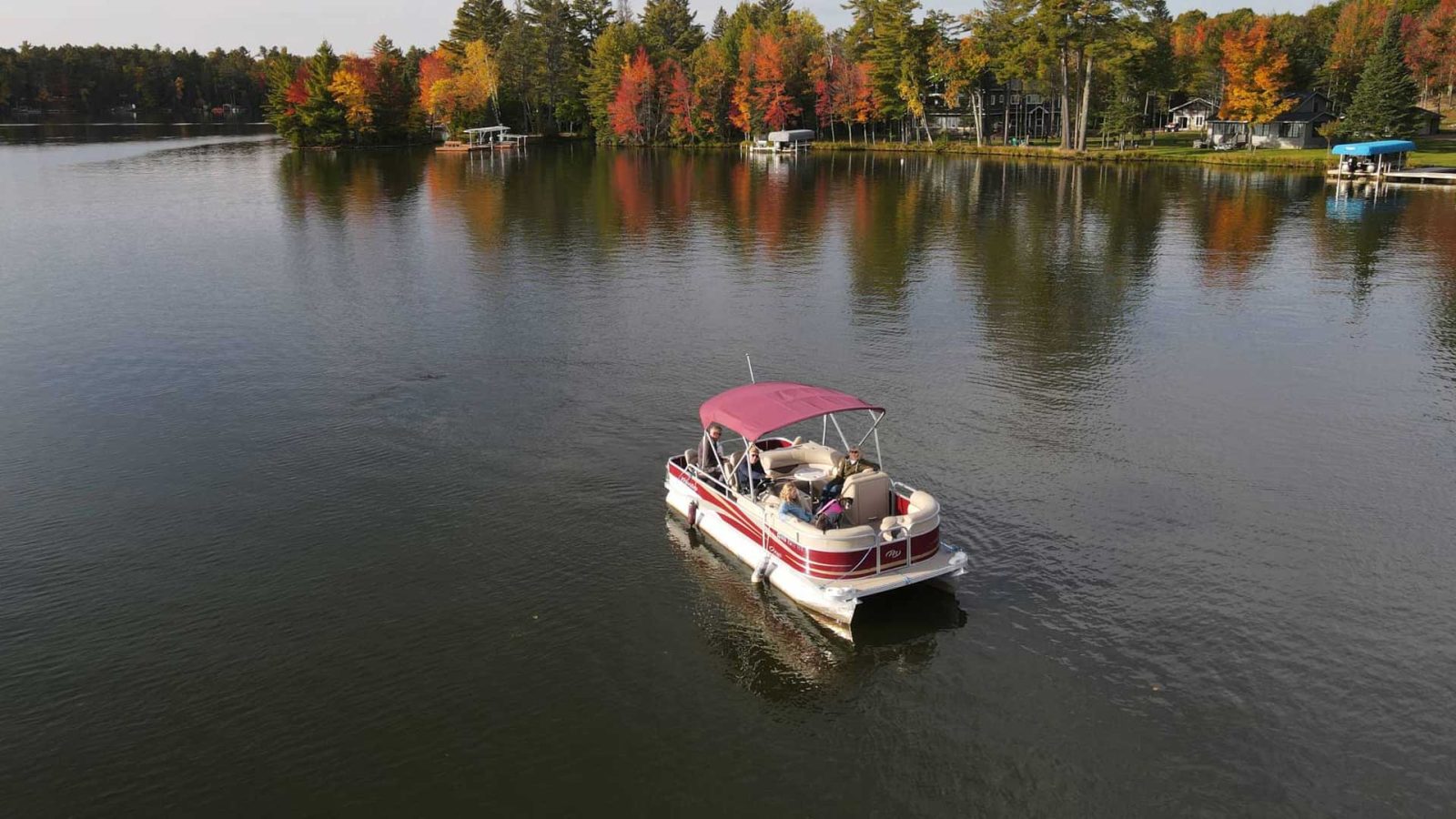 Boating on Otter Lake in fall Vilas County WI