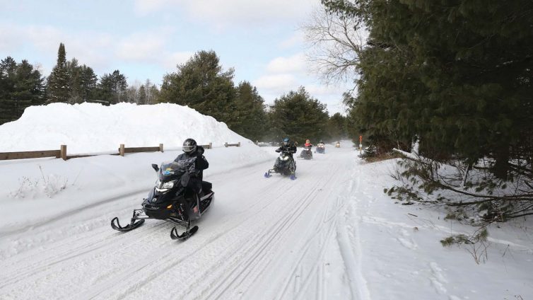Riders on Frosty Snowmobile Trail