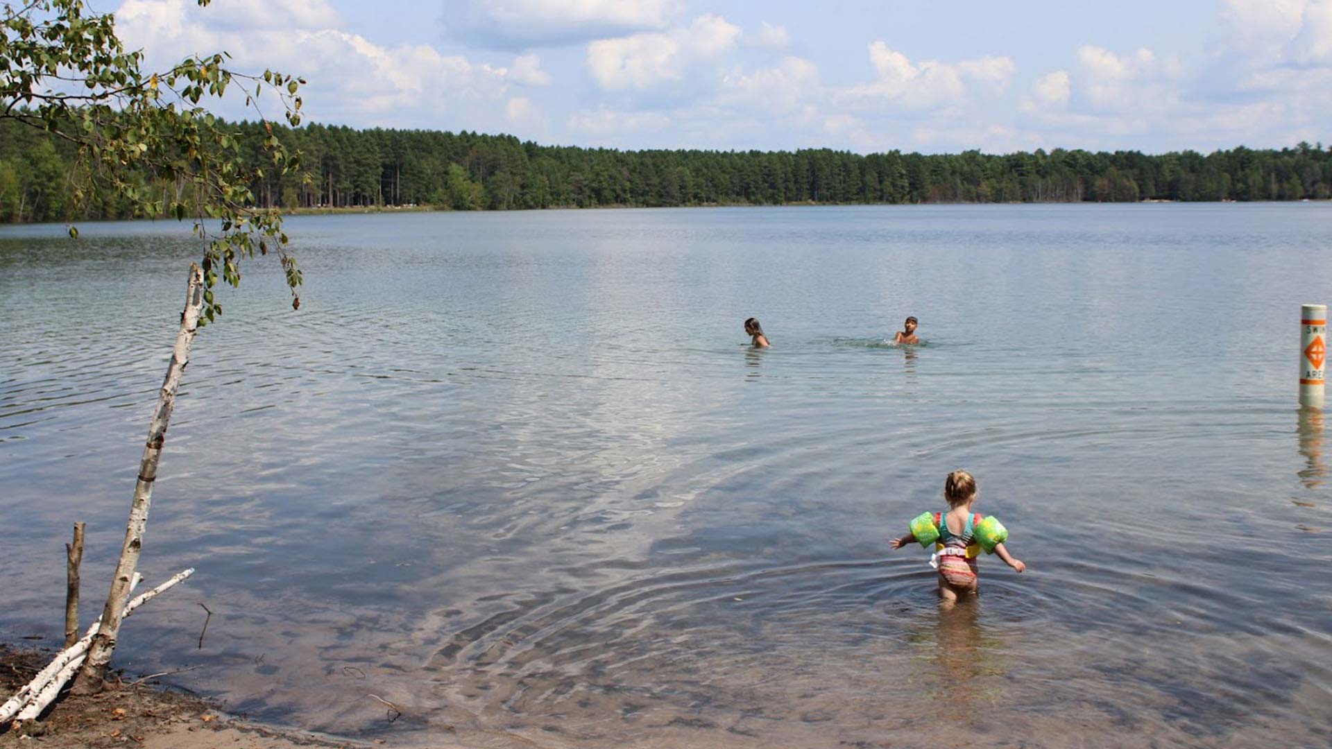 Kids swimming at Crystal Lake Campground