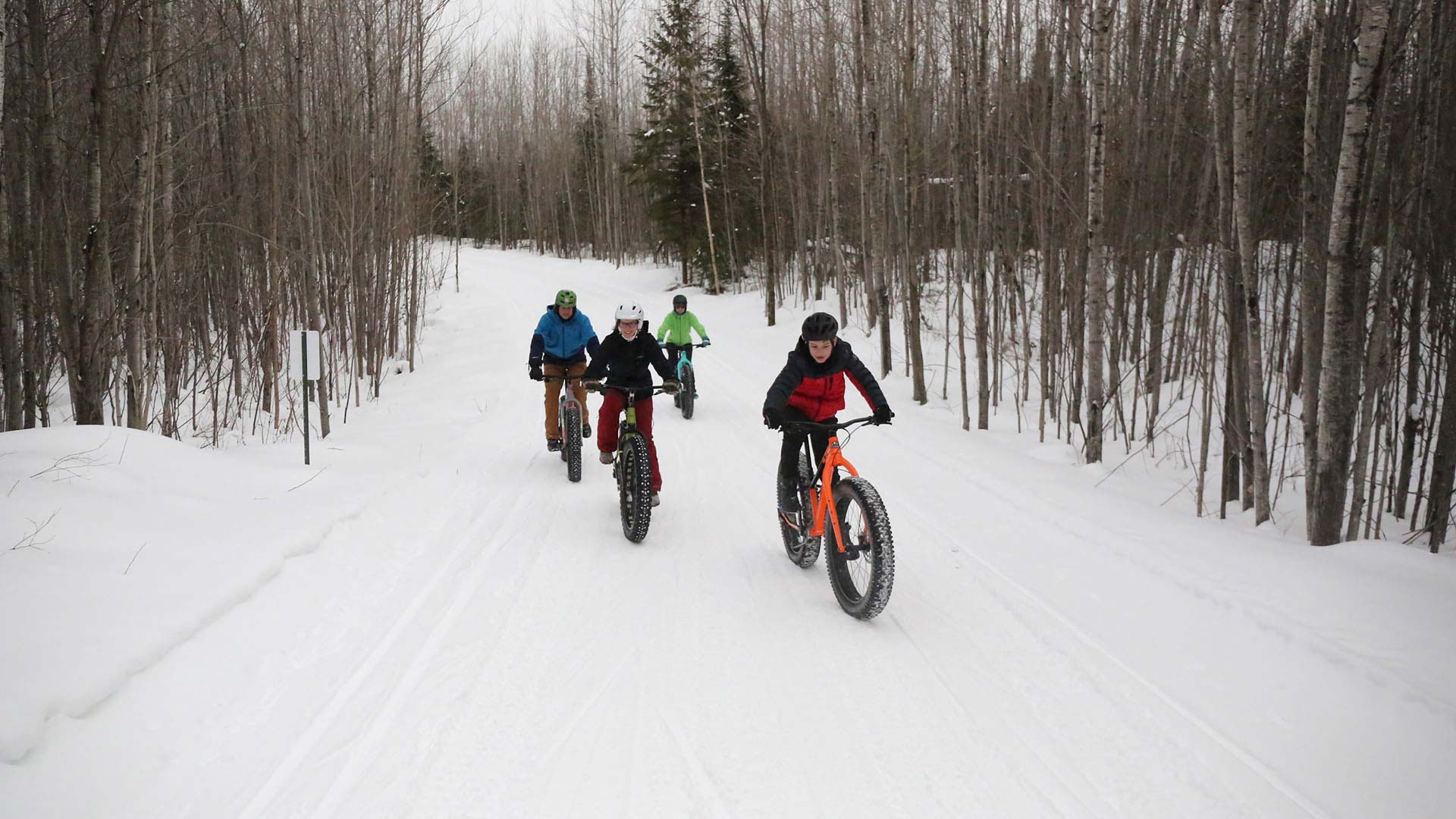 Family fat-biking on WinMan Trail