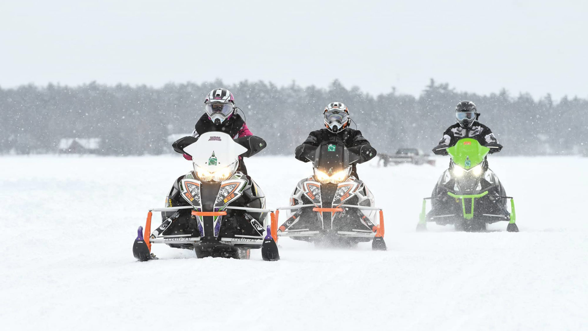 Snowmobilers riding on Dollar Lake near Eagle River in Vials County Wisconsin