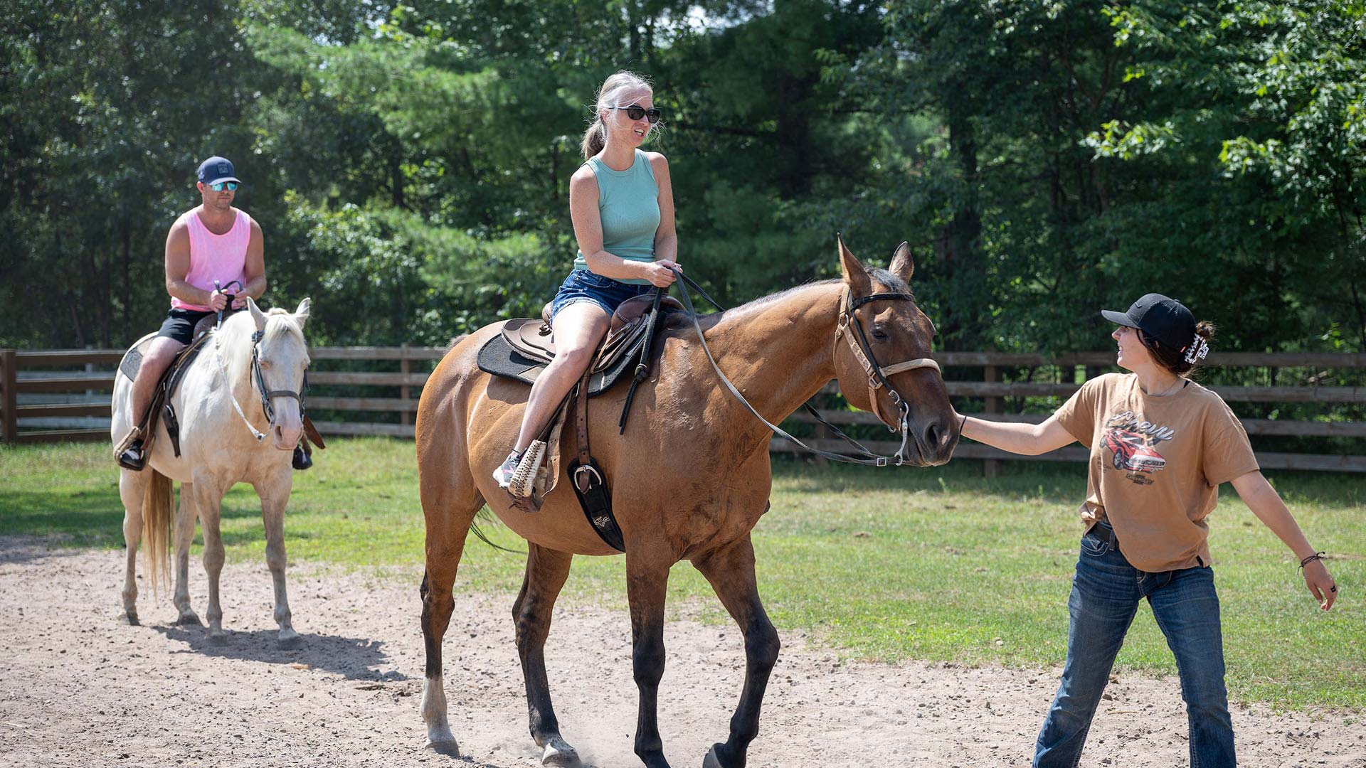 Couple being guided on horses at Elmer's Fun Park