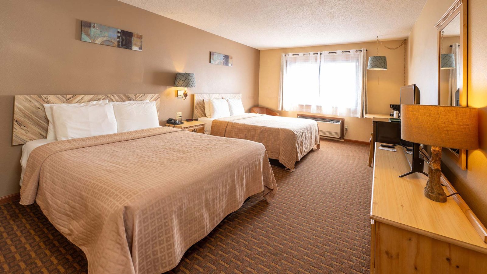 A double-king bedroom on display at Hearthside Inn