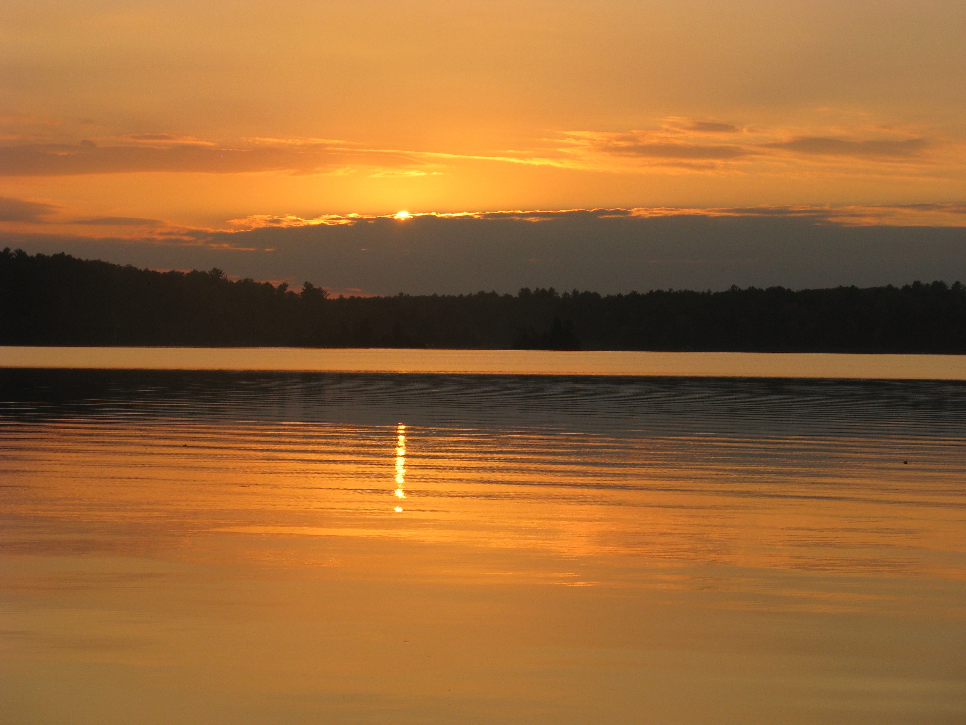 Sunsetting over Buckatabon Lake in Conover, WI
