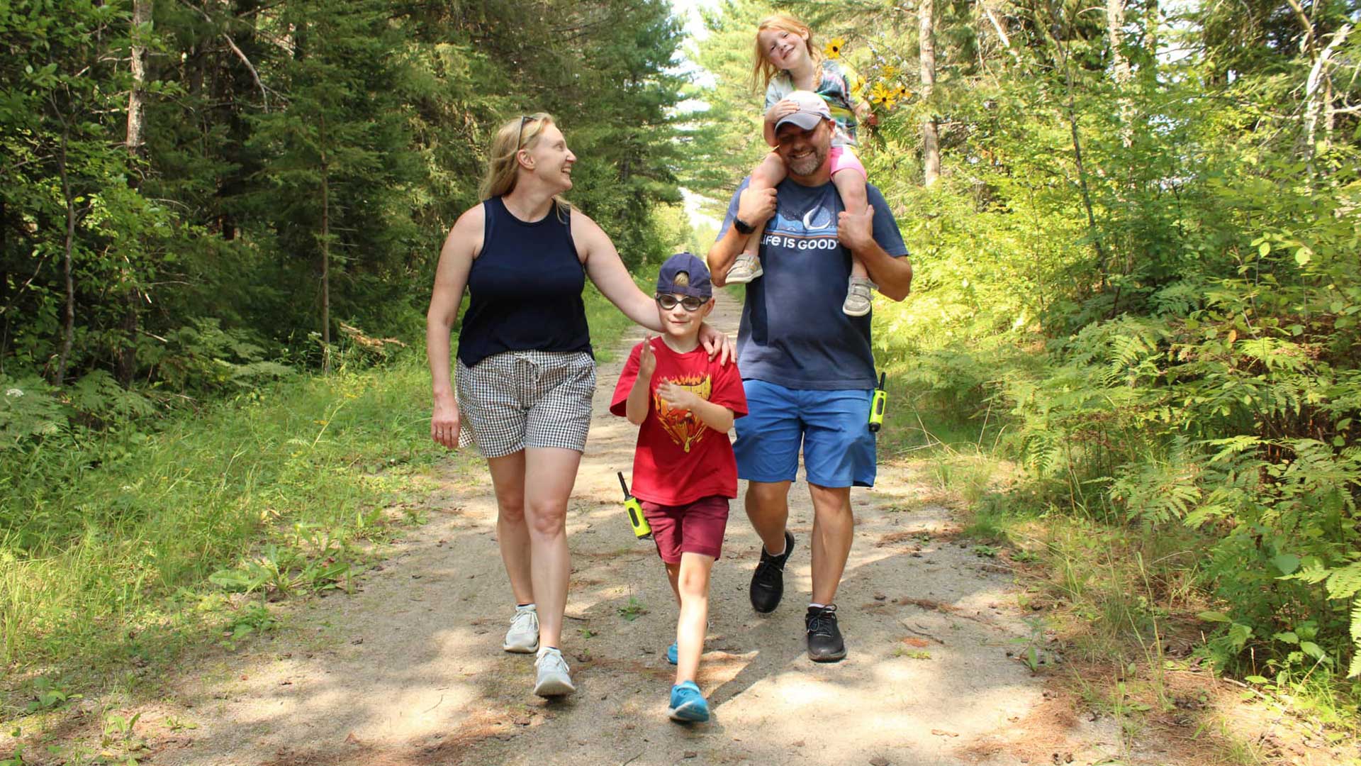 Family hiking on the Conover Phelps Trail in Vilas County Wisconsin