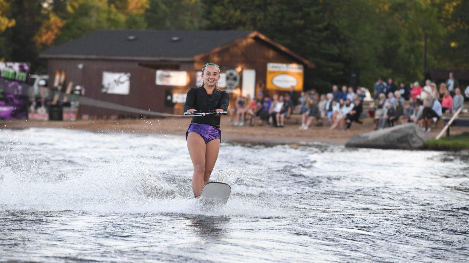 Girl waterskiing at Chain Skimmers Water Ski Show in Conover Vilas County Wisconsin