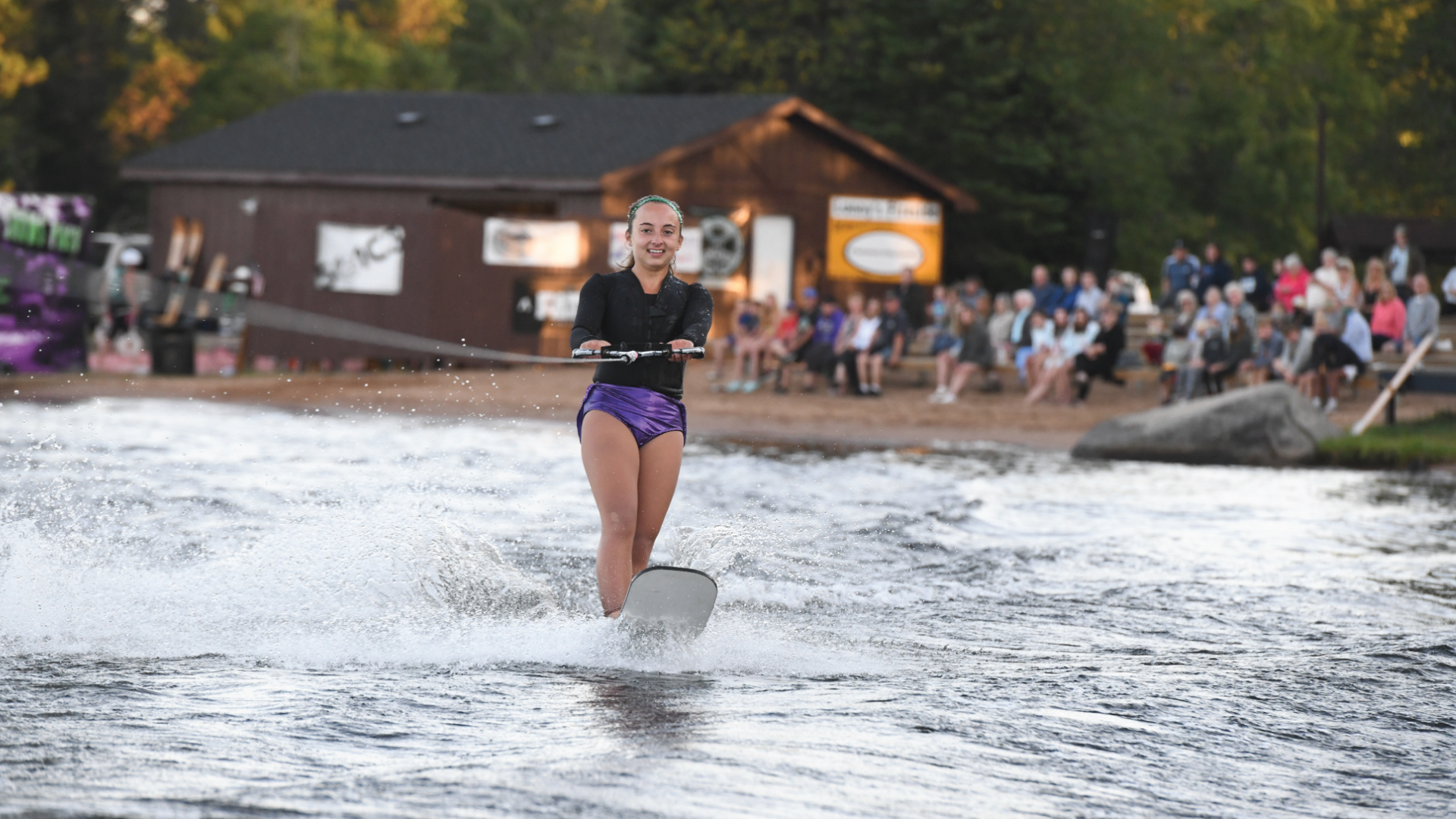 Girl waterskiing at Chain Skimmers Water Ski Show in Conover Vilas County Wisconsin