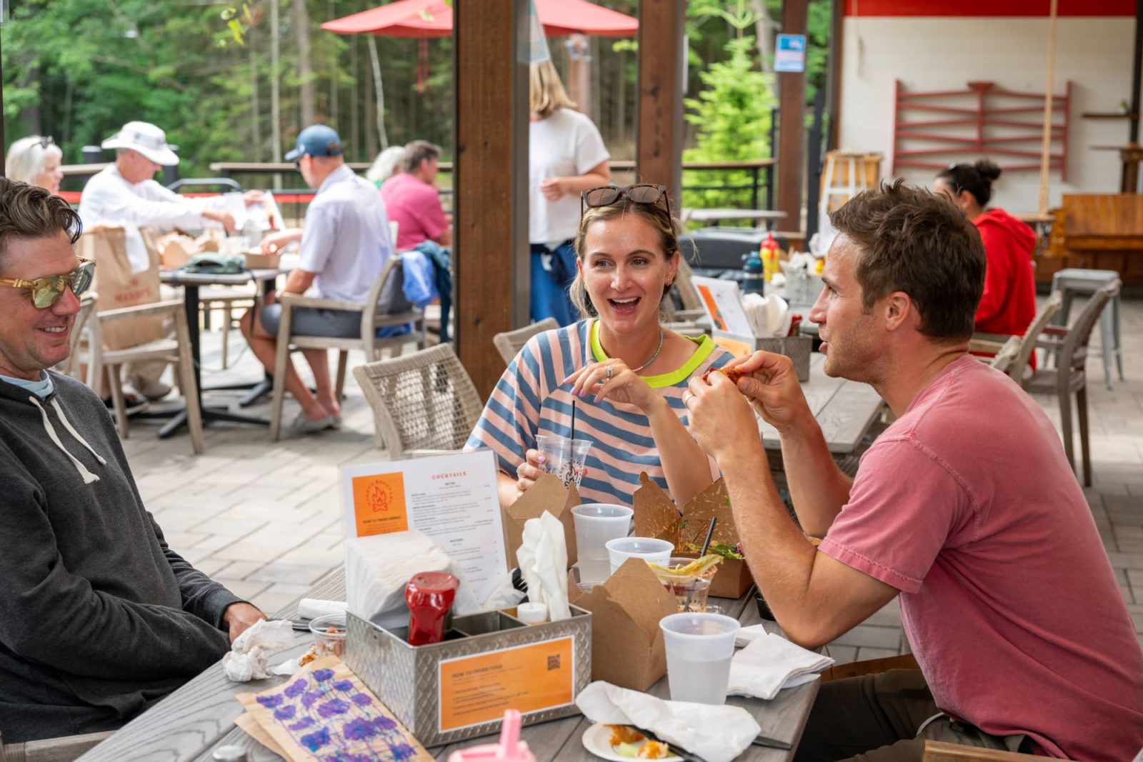 People dining on the patio at Manny’s Parkside in Manitowish Waters Vilas County Wisconsin
